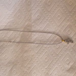 Spotted gray stone cross pendant